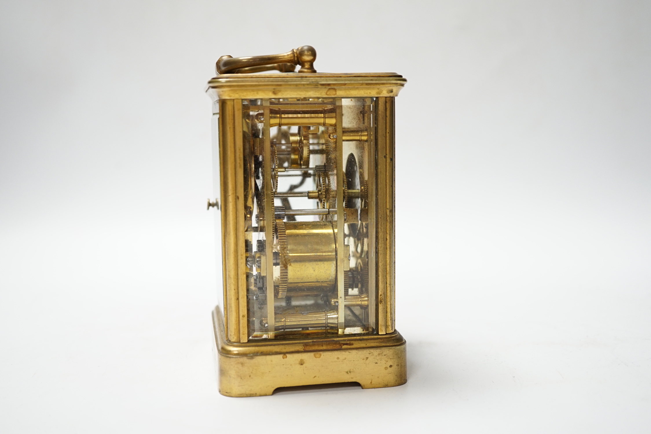 A brass carriage clock with subsidiary dial, 16cm high